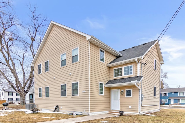 view of front of property with central AC unit