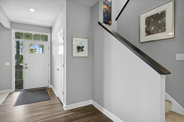 entryway with hardwood / wood-style floors