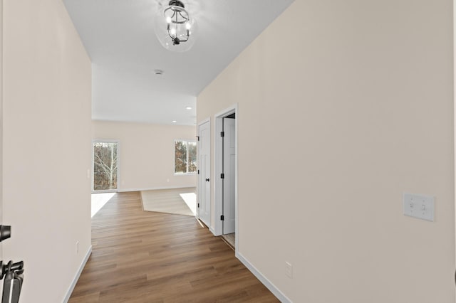 hallway featuring light wood-type flooring