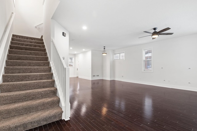 interior space featuring hardwood / wood-style floors and ceiling fan