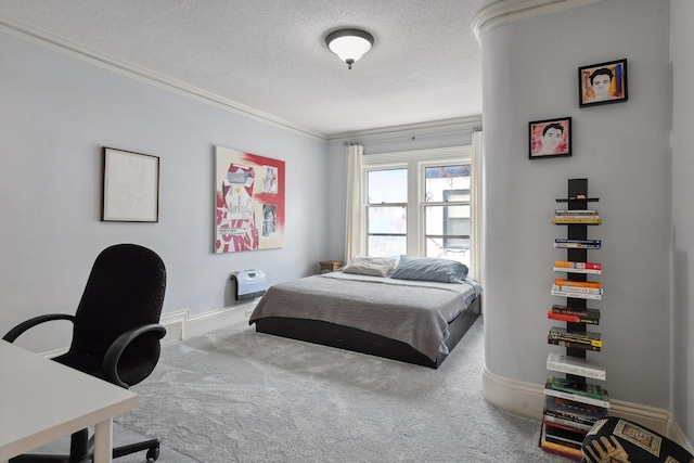 carpeted bedroom featuring crown molding and a textured ceiling