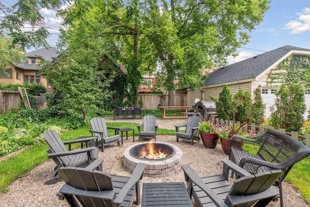 view of patio featuring an outdoor fire pit