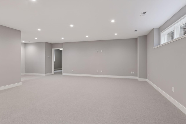 basement with light carpet