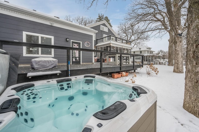 view of pool featuring area for grilling, a deck, and a hot tub