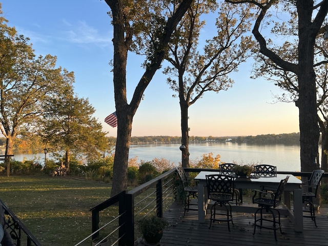 wooden deck with a water view