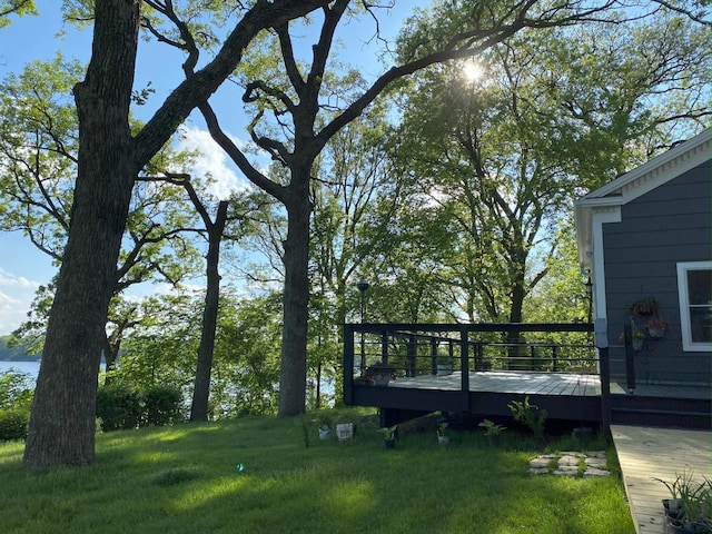 view of yard with a wooden deck