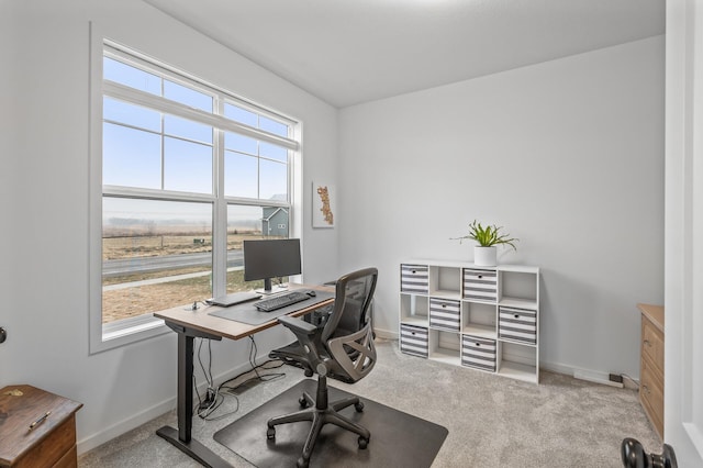 home office featuring light colored carpet