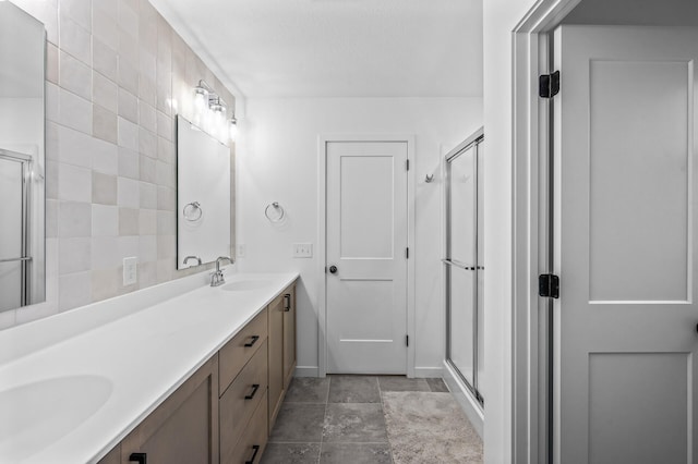 bathroom with vanity and walk in shower