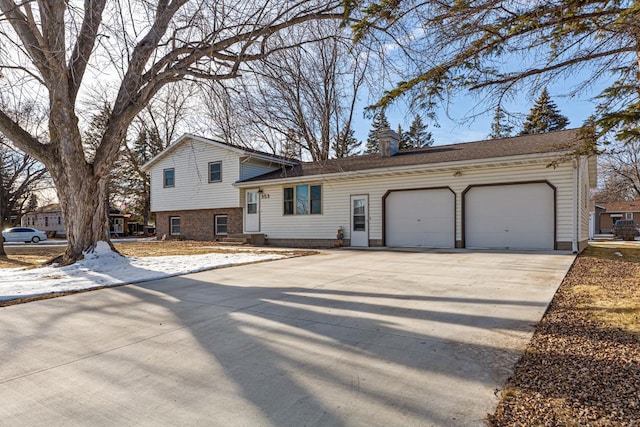 split level home featuring a garage