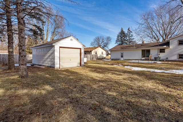 view of yard with an outbuilding and a garage