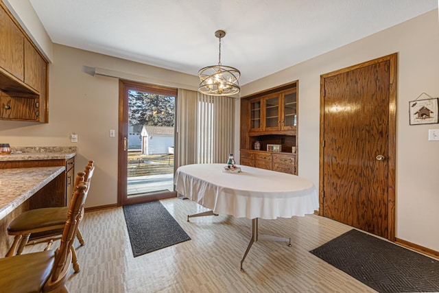 dining room with a chandelier