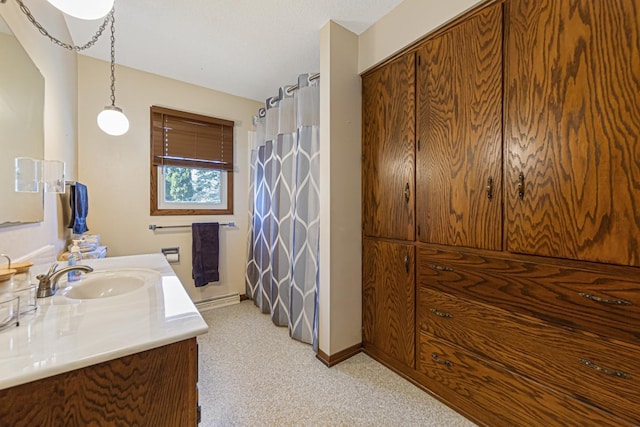 bathroom featuring vanity and walk in shower