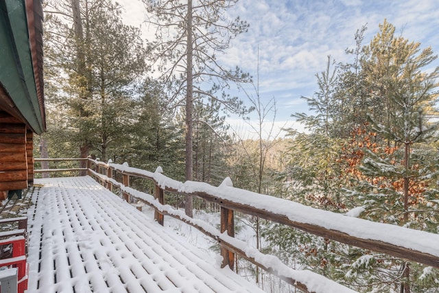 view of snow covered deck