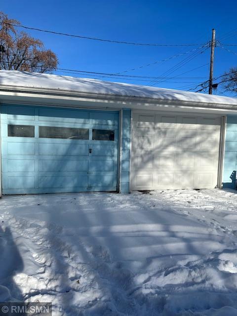 view of snow covered garage