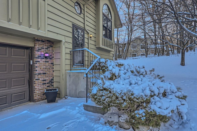 view of snow covered property