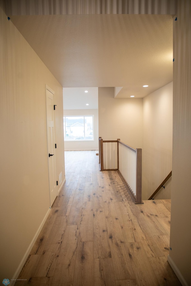 hallway featuring light hardwood / wood-style floors