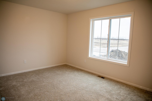 view of carpeted spare room