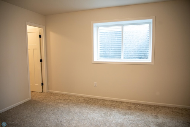 view of carpeted spare room