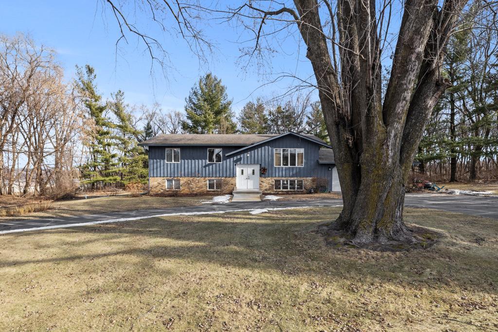 12380 Jason Ave, Nininger Twp, MN 55033 - view of front of home featuring a front yard