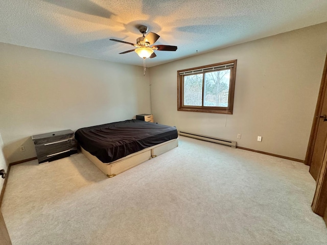 bedroom with a textured ceiling, light colored carpet, ceiling fan, and a baseboard heating unit