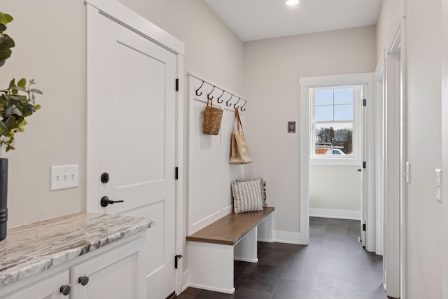 mudroom featuring recessed lighting and baseboards