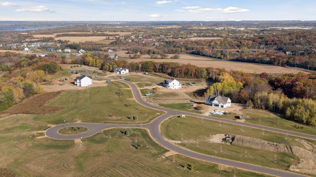 birds eye view of property with a rural view