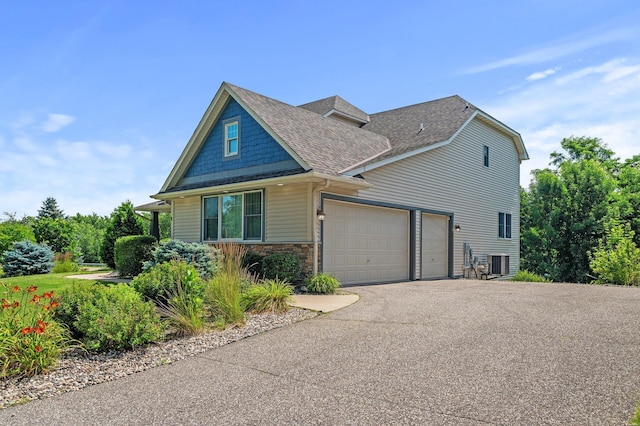 view of side of property with central AC unit