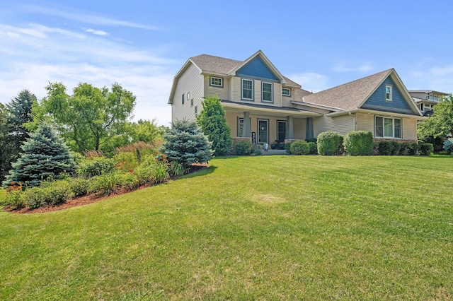 view of front of house featuring a front lawn and a porch