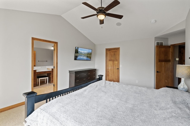 bedroom with ensuite bathroom, ceiling fan, light colored carpet, and lofted ceiling