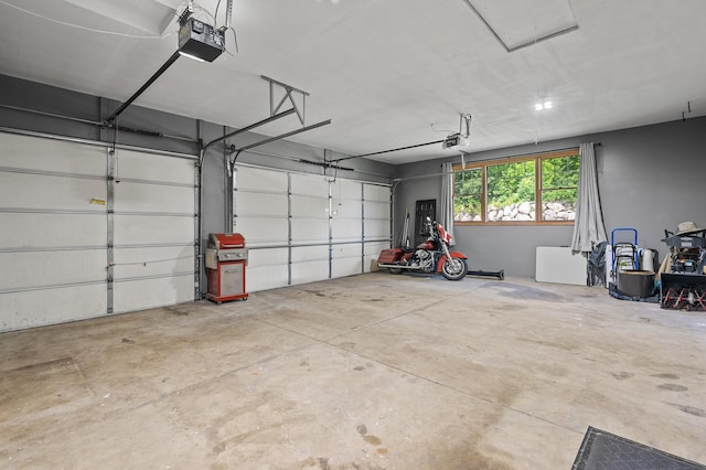 garage featuring a garage door opener