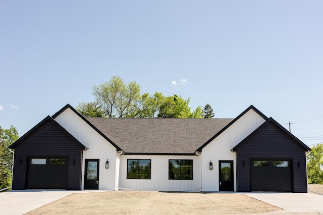 102 3rd Ave, Pelican Rapids, MN 56572 - modern inspired farmhouse featuring a garage, concrete driveway, and a shingled roof