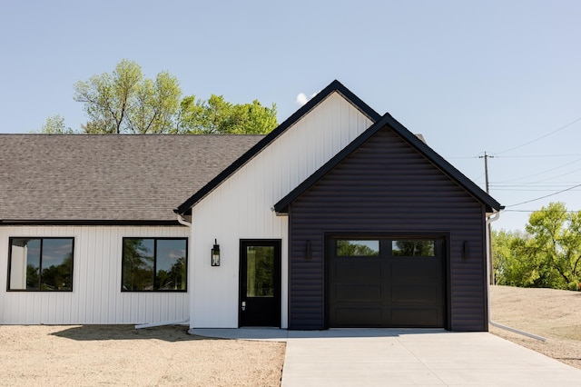 102 3rd Ave, Pelican Rapids, MN 56572 - modern inspired farmhouse with a shingled roof, an attached garage, and driveway