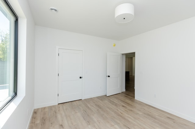 102 3rd Ave, Pelican Rapids, MN 56572 - unfurnished bedroom featuring light wood finished floors and baseboards