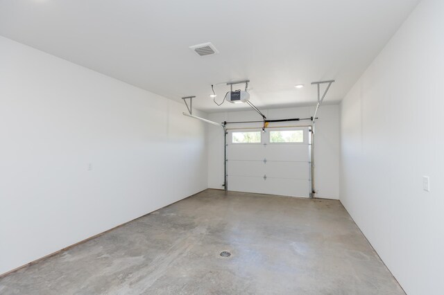 102 3rd Ave, Pelican Rapids, MN 56572 - garage featuring a garage door opener