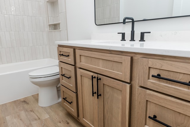 102 3rd Ave, Pelican Rapids, MN 56572 - full bathroom with vanity, wood finished floors, and shower / bath combination