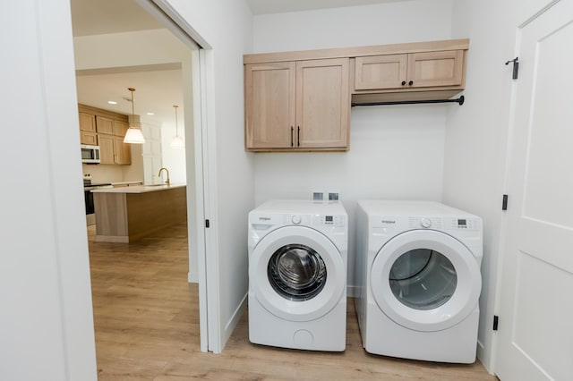 102 3rd Ave, Pelican Rapids, MN 56572 - laundry area with separate washer and dryer, light wood-style floors, and recessed lighting