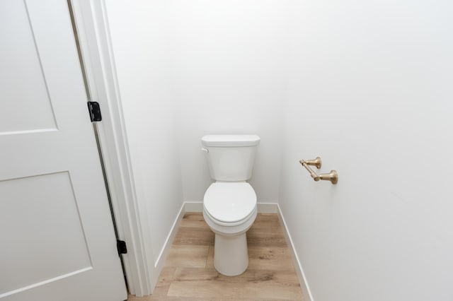 102 3rd Ave, Pelican Rapids, MN 56572 - bathroom with toilet and wood finished floors