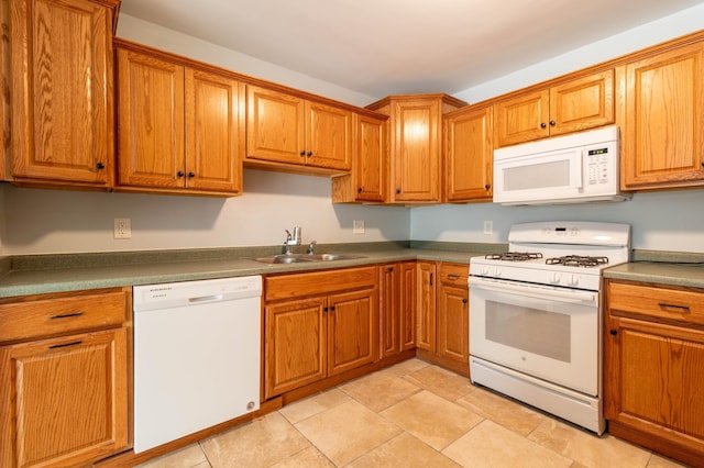 kitchen with white appliances and sink