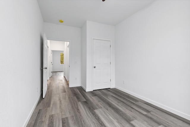 interior space with dark hardwood / wood-style flooring