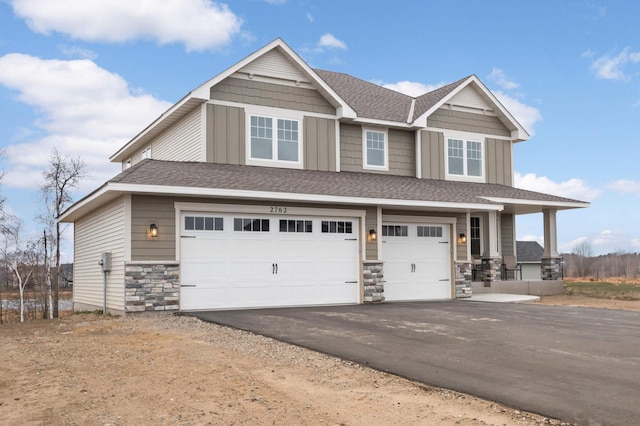 craftsman-style house featuring a garage