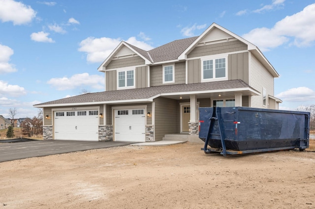 craftsman inspired home featuring a garage