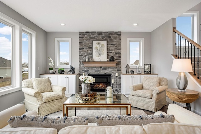 living room featuring a fireplace