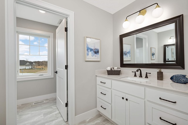 bathroom featuring vanity