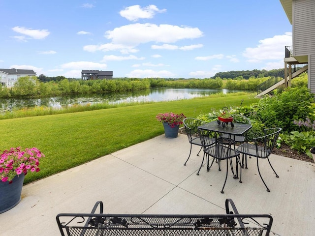 view of patio / terrace featuring a water view