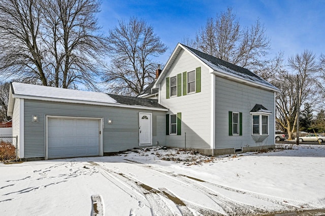 view of front property with a garage