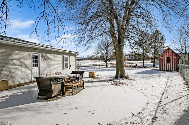 view of yard covered in snow