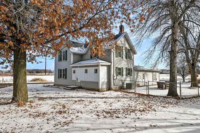 view of front of home with cooling unit