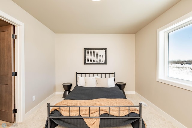 131 Pine Ave, Mapleton, ND 58059 - bedroom with light colored carpet and baseboards
