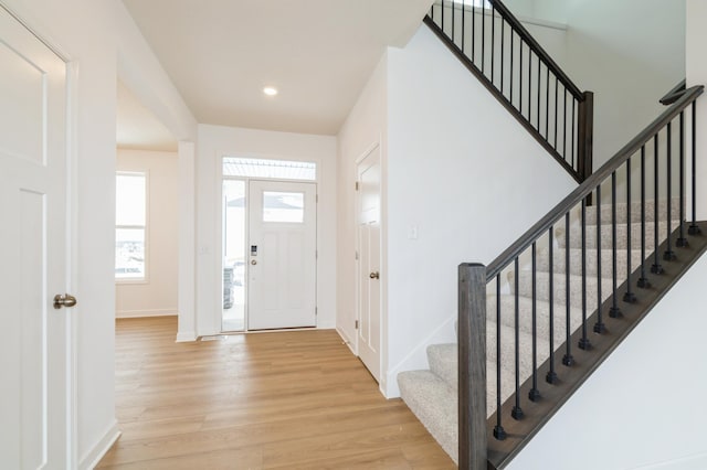 foyer with light hardwood / wood-style flooring