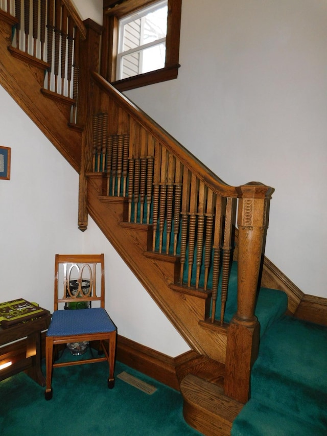 stairway with carpet flooring